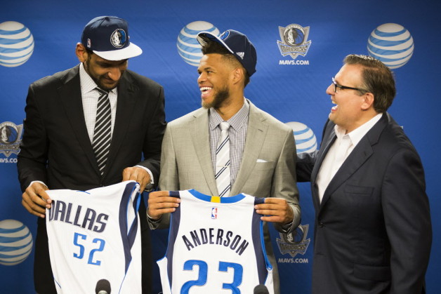 Dallas Mavericks president of basketball operations Donnie Nelson (right) laughs with  Justin Anderson and Satnam Singh as the team introduces their 2015 draft picks during a press conference at American Airlines Center on Wednesday, July 8, 2015, in Dallas. (Smiley N. Pool/The Dallas Morning News)