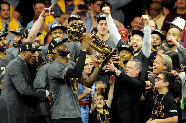 Jun 19, 2016; Oakland, CA, USA; Cleveland Cavaliers forward LeBron James (23) celebratew with the Larry O'Brien Championship Trophy after beating the Golden State Warriors in game seven of the NBA Finals at Oracle Arena. Mandatory Credit: Gary A. Vasquez-USA TODAY Sports