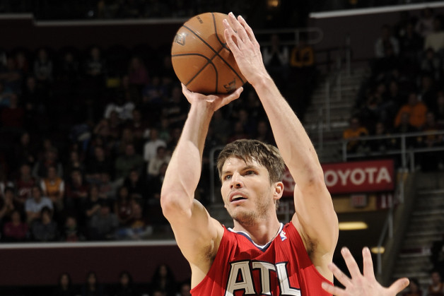 CLEVELAND, OH - DECEMBER 26: Kyle Korver #26 of the Atlanta Hawks goes up for the shot against the Cleveland Cavaliers at The Quicken Loans Arena on December 26, 2013 in Cleveland, Ohio. NOTE TO USER: User expressly acknowledges and agrees that, by downloading and/or using this Photograph, user is consenting to the terms and conditions of the Getty Images License Agreement. Mandatory Copyright Notice: Copyright 2013 NBAE (Photo by David Liam Kyle/NBAE via Getty Images)