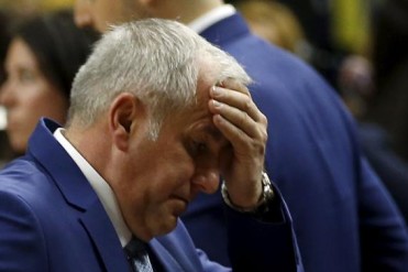 Fenerbahce's coach Obradovic reacts as he leaves the court after their Euroleague Final Four semi-final basketball game against Real Madrid in Madrid